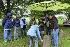 Mary-explaning-coffin-man-stone